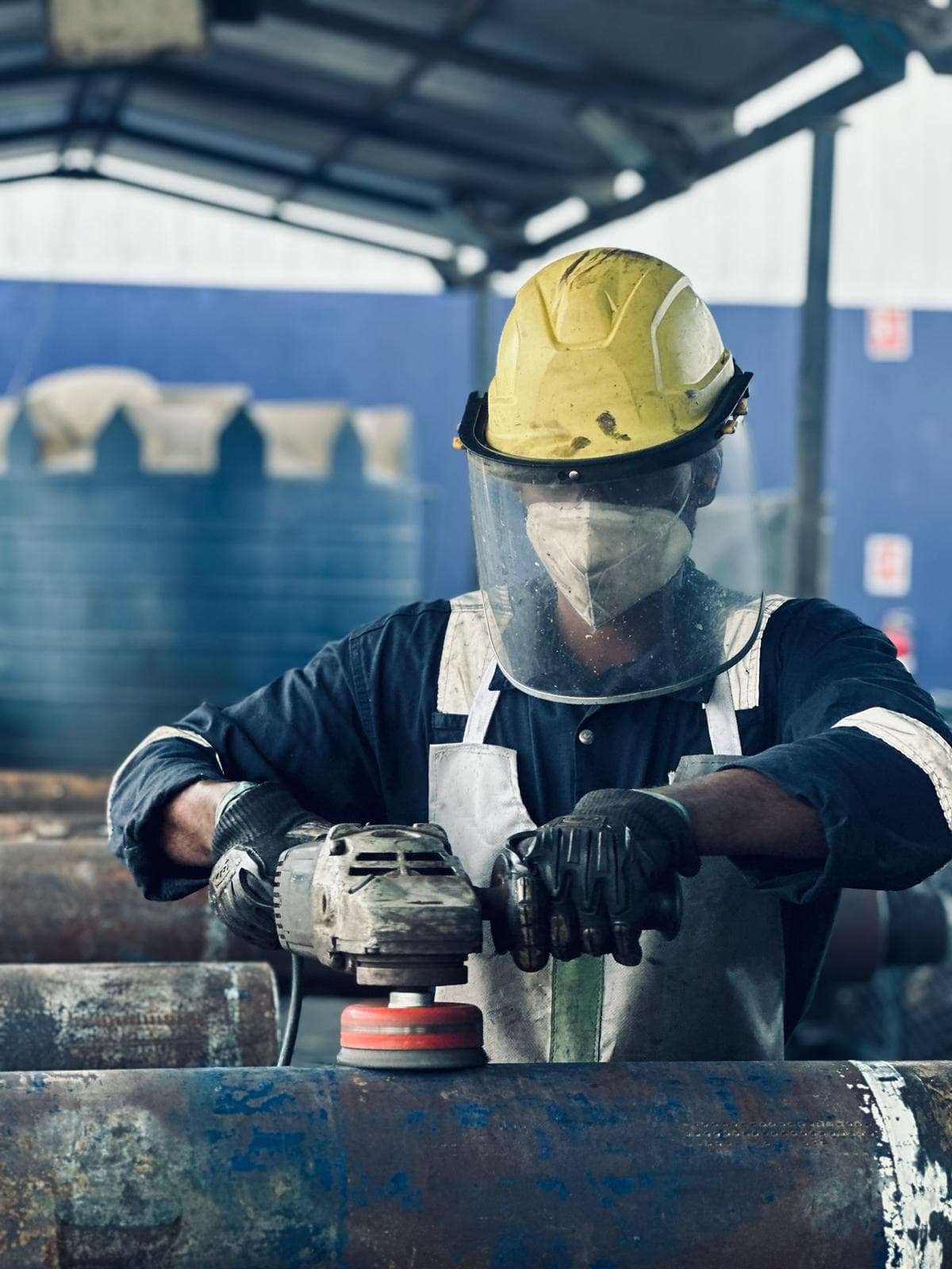 Blacktech technician performing workshop inspection